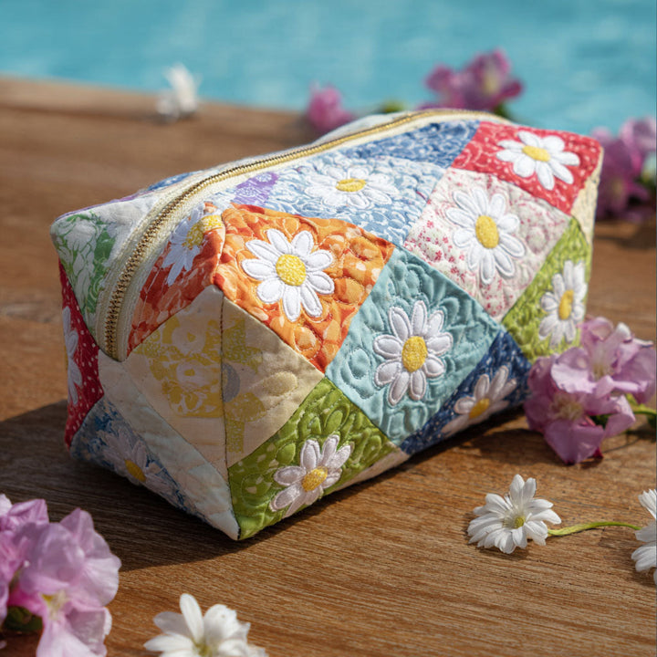 Gesteppte Kosmetiktasche mit Blumenmuster