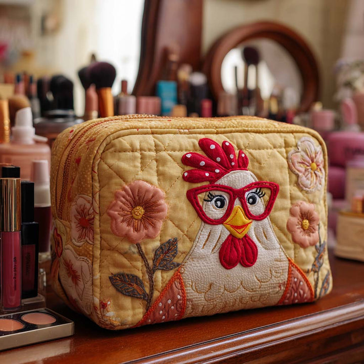 Gesteppte Kosmetiktasche mit leuchtendem Huhn