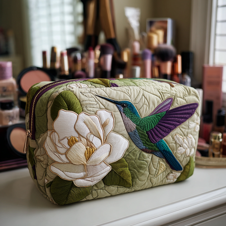 Gesteppte Kosmetiktasche mit Kolibris auf der Wiese